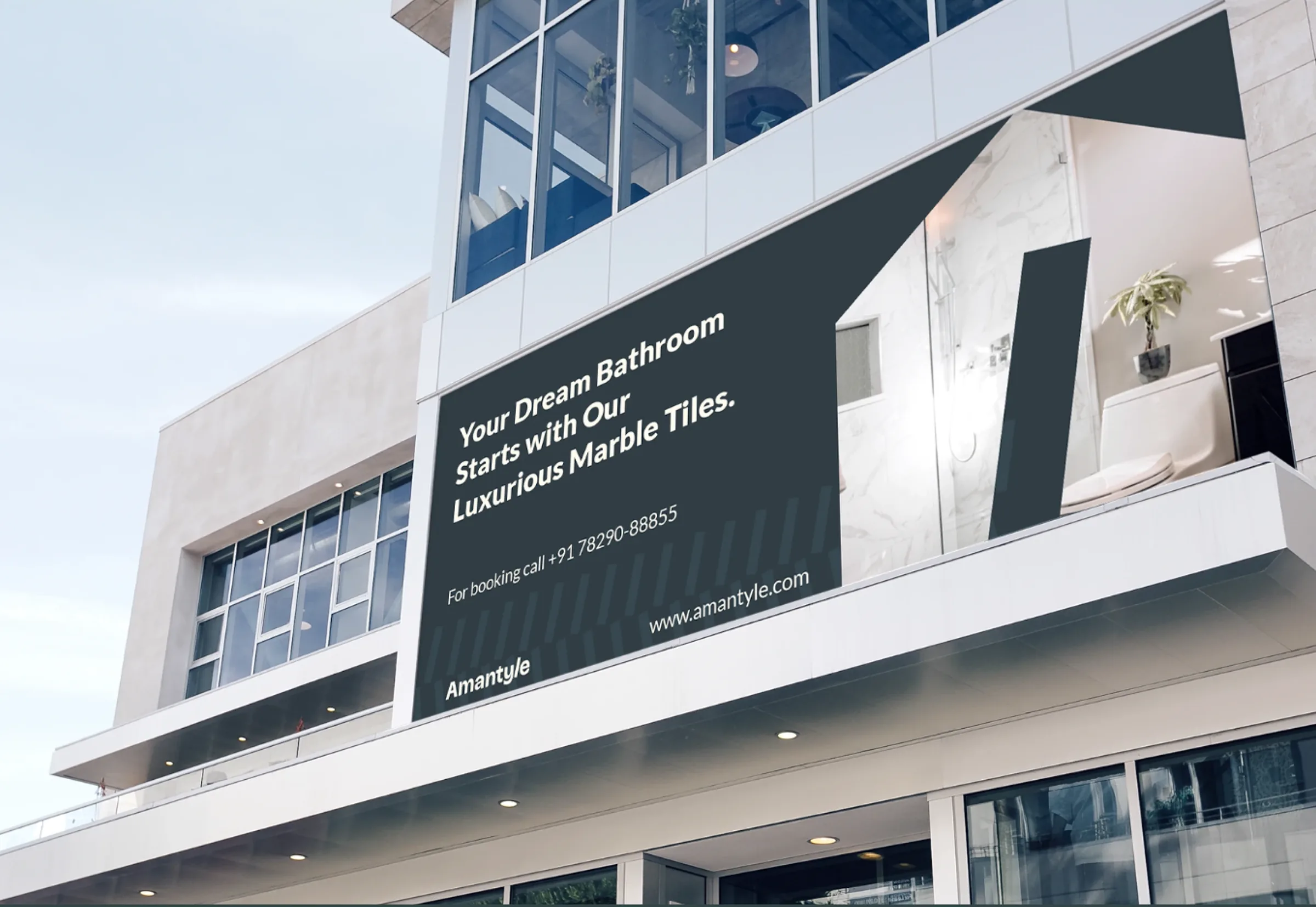 A billboard on a building front: a slate panel reading Your Dream Bathroom Starts with Our Luxurious Marble Tiles, a bathroom photograph and the Amantyle wordmark.