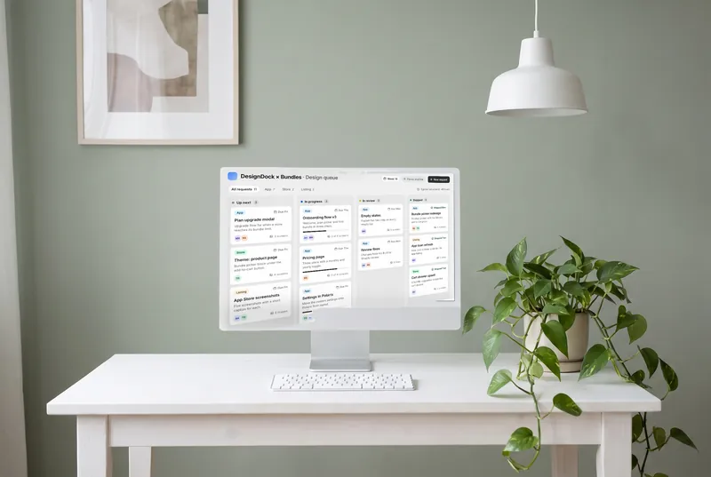 A weekly design queue board on a desktop computer in a calm studio